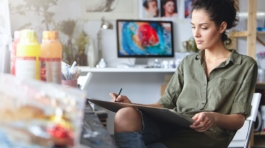 portrait-busy-confident-young-brunette-woman-designer-ripped-jeans-working-new-art-project-making-drawings-sketches-tablet-beautiful-female-artist-absorbed-with-her-creative-work_273609-341